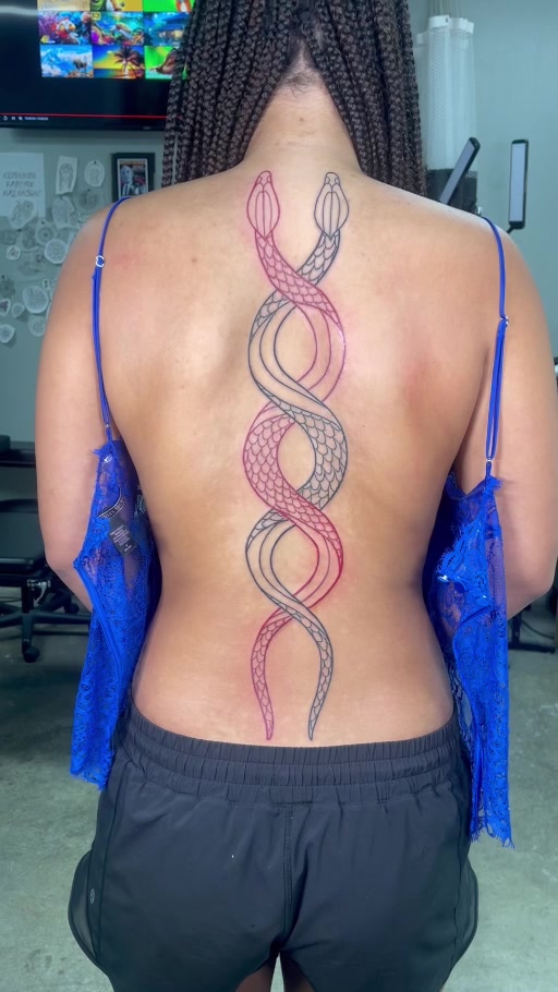 Geometric DNA-style spine tattoo