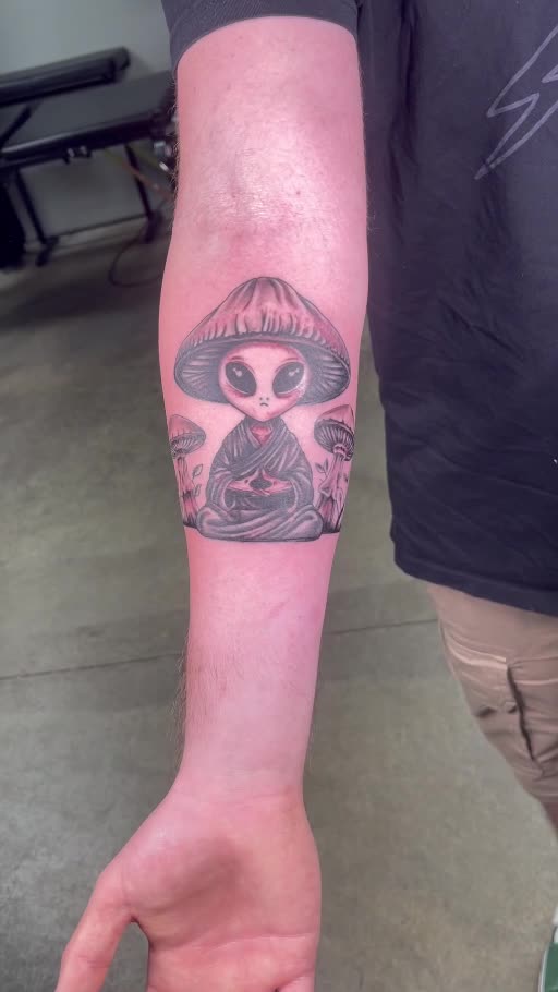 Black and grey sugar skull forearm tattoo