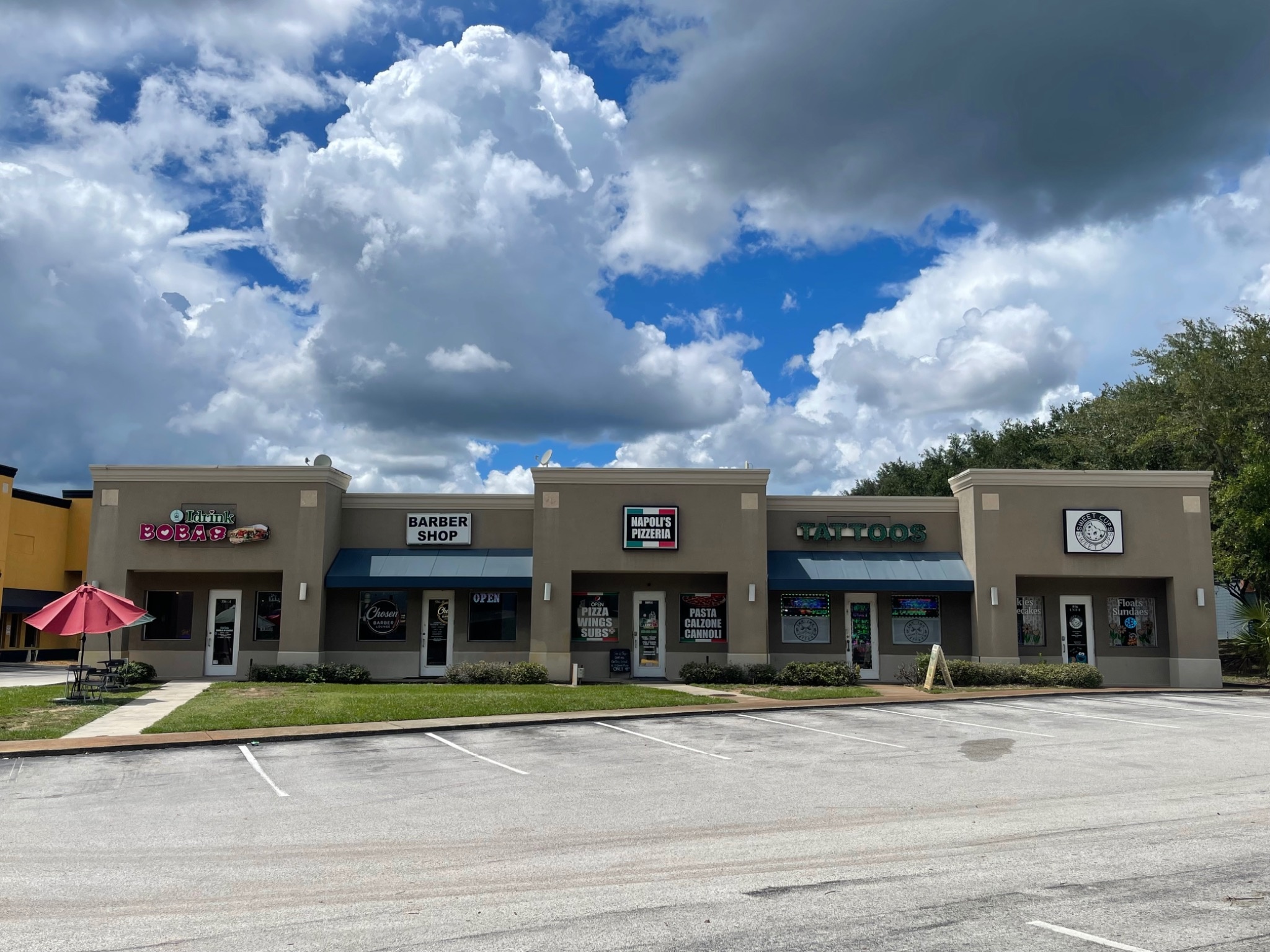 Ink Ink Tattoos storefront in Trailside Plaza, Minneola, Florida